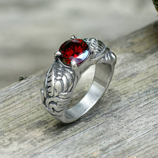 Ring aus Edelstahl mit roten Kristallflügeln