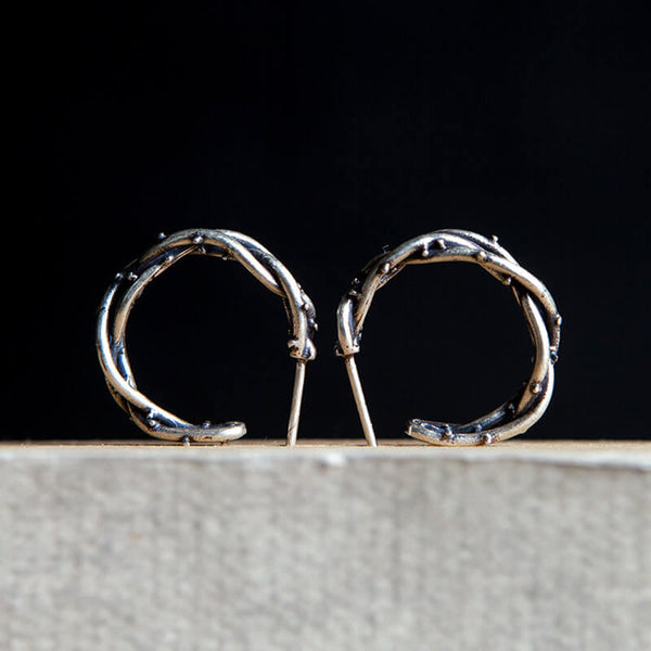 Boucles d'oreilles en argent sterling avec épines sinueuses